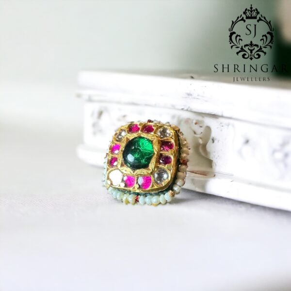 Gold ring in emerald ,rubies and diamond polki with cultured pearls