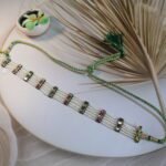 Shishfool Mathapatti, an exquisite head ornament crafted in 22-karat gold.