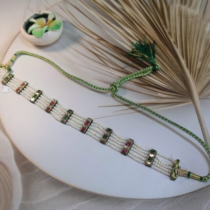 Shishfool Mathapatti, an exquisite head ornament crafted in 22-karat gold.