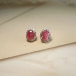 22Kt gold earrings adorned with natural diamonds and vivid rubies – a timeless blend of grace and grandeur.