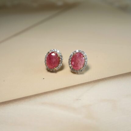 22Kt gold earrings adorned with natural diamonds and vivid rubies – a timeless blend of grace and grandeur.