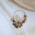 22kt gold nath embellished with diamond polkis, emeralds, rubies, and freshwater pearls – handcrafted traditional Indian nose ring.