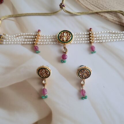 22kt gold choker set with Kundan stones, rubies, emeralds, and freshwater rice pearls, traditional handcrafted Indian jewelry.