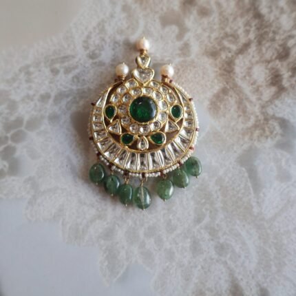 22kt gold Chandrama jewellery with Kundan stones, emeralds, and freshwater pearls – traditional bridal accessory
